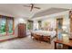 Bright main bedroom with a vaulted ceiling, natural light, and a ceiling fan at 109 Loch Haven Ln, Cary, NC 27518