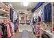 A large walk-in closet with custom shelving and organizers at 109 Loch Haven Ln, Cary, NC 27518