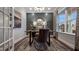 Stylish office with paneled walls, a modern desk, comfortable seating, and natural light at 1111 Cosmic Dr, Durham, NC 27703