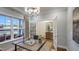 Bright home office featuring a large window, modern desk, and stylish decor at 1111 Cosmic Dr, Durham, NC 27703