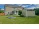 Spacious backyard featuring a screened porch, garden beds, storage shed, and lush lawn at 1116 Powder, Fuquay Varina, NC 27526