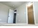 Bedroom with neutral walls and carpet and doorway to closet and door to bathroom at 1116 Powder, Fuquay Varina, NC 27526