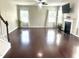 Open living room with hardwood floors, fireplace, and lots of natural light at 1116 Powder, Fuquay Varina, NC 27526