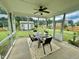 Enclosed sunroom featuring seating and views of the backyard at 1116 Powder, Fuquay Varina, NC 27526