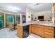 Kitchen showcasing dishwasher, granite countertops, and dining area with view at 112 Hidden Bluff Ln, Cary, NC 27513