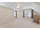 Inviting bedroom features neutral tones, ample natural light, and a rocking chair at 115 Spring Branch Dr, Four Oaks, NC 27524