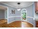 Cozy breakfast nook with natural light and hardwood floors at 11816 Stannary Pl, Raleigh, NC 27613
