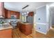 Updated kitchen with granite countertops, stainless steel appliances, and a center island at 11816 Stannary Pl, Raleigh, NC 27613