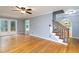 Hardwood flooring in a living room that has access to the dining room and the back yard at 11816 Stannary Pl, Raleigh, NC 27613