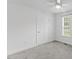 Cozy bedroom features a neutral color scheme, closet and window at 12449 W Pamlico St, Middlesex, NC 27557