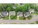 Stunning aerial view of a beautiful neighborhood featuring well-manicured lawns and mature trees at 13121 Sargas St, Raleigh, NC 27614