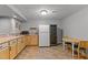 Basement kitchen with a sink, microwave, and wine fridge at 13121 Sargas St, Raleigh, NC 27614