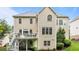 Exterior of the home with a large deck on the upper level at 13121 Sargas St, Raleigh, NC 27614
