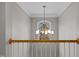 Foyer with decorative chandelier highlighting the home's entryway at 13121 Sargas St, Raleigh, NC 27614