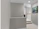 Upstairs hallway with neutral paint and trim, leading to bedrooms at 13121 Sargas St, Raleigh, NC 27614