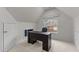 Bright office featuring a built-in desk beneath a window with white trim and neutral walls at 13121 Sargas St, Raleigh, NC 27614