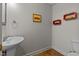 Basement powder room with unique decorative touches at 13121 Sargas St, Raleigh, NC 27614