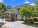 Expansive backyard featuring a screened porch, patio, and privacy landscaping at 1420 Norwood Crest Ct, Raleigh, NC 27614