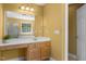 This bathroom features a spacious vanity area, complete with a sink and mirror, while providing access to a nearby bathtub and shower at 1420 Norwood Crest Ct, Raleigh, NC 27614