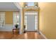 Bright foyer with hardwood floors, high ceilings, transom windows, and natural light at 1420 Norwood Crest Ct, Raleigh, NC 27614