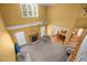 Open living room with fireplace, ceiling fan and view of dining area at 1420 Norwood Crest Ct, Raleigh, NC 27614