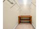 Large closet with built-in shelving and a wooden desk at 1420 Taylor Farm Rd, Raleigh, NC 27603