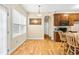 Kitchen space showcasing an island with seating, wood cabinets, and natural light at 1420 Taylor Farm Rd, Raleigh, NC 27603