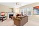 Inviting living room with a fireplace, comfortable seating, and a bright ambiance at 1420 Taylor Farm Rd, Raleigh, NC 27603