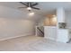 Bonus room featuring neutral colored walls, a wet bar and a staircase at 2008 Van Hook Ln, Apex, NC 27502