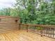 Wood deck with wood railing overlooking wooded scenery at 2008 Van Hook Ln, Apex, NC 27502