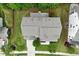 An overhead view shows the layout of a single Gathering home's roof, yard, and driveway at 213 Preatonwood Dr, Apex, NC 27539