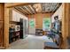 A partially finished basement includes cabinetry, utilities, and an exterior door at 213 Preatonwood Dr, Apex, NC 27539