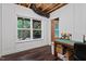 Partially finished basement with a view of trees outside the window at 213 Preatonwood Dr, Apex, NC 27539