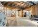Spacious unfinished basement with natural light and kitchenet rough-in, ready to be customized for extra living space at 213 Preatonwood Dr, Apex, NC 27539