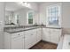 Bathroom featuring a granite countertop vanity, with a large mirror, and great natural light at 213 Preatonwood Dr, Apex, NC 27539
