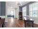 Open office space showcasing hardwood floors, natural light, and stylish decor at 213 Preatonwood Dr, Apex, NC 27539