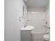 Full bathroom featuring a shower-tub combo, single sink vanity, and a standard toilet at 230 Park Ave, Rocky Mount, NC 27801