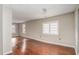 Expansive living room featuring hardwood floors and ample natural light, ideal for modern living at 230 Park Ave, Rocky Mount, NC 27801