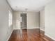 Spacious living room with hardwood floors and soft gray walls, perfect for relaxing or entertaining guests at 230 Park Ave, Rocky Mount, NC 27801