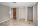 Tiled room offers access to other areas, presenting versatile opportunities for layout design at 230 Park Ave, Rocky Mount, NC 27801