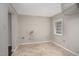 Versatile room with tiled floors and utility hookups, offering potential for laundry or storage at 230 Park Ave, Rocky Mount, NC 27801