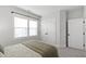 Bedroom featuring double closets and a bright window with lots of natural light at 248 Daniel Ridge Rd, Wendell, NC 27591