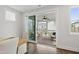 Bright dining area featuring sliding glass doors to a screened-in porch and modern finishes at 248 Daniel Ridge Rd, Wendell, NC 27591