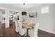 Bright dining room featuring a wooden table, white chairs, and modern decor at 248 Daniel Ridge Rd, Wendell, NC 27591