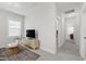 Open living room offers natural light and access to the en-suite bathroom and closet at 248 Daniel Ridge Rd, Wendell, NC 27591