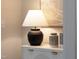 Tastefully decorated dresser in a living room, complemented by elegant lamps and artwork at 248 Daniel Ridge Rd, Wendell, NC 27591