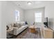 Comfortable living room with a cozy couch and decorative rug at 248 Daniel Ridge Rd, Wendell, NC 27591