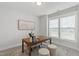 Bright home office with decorative rug, natural light, and modern furnishings at 248 Daniel Ridge Rd, Wendell, NC 27591