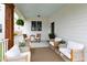 Inviting front porch with comfortable seating and stylish outdoor decor at 248 Daniel Ridge Rd, Wendell, NC 27591