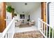 Inviting front porch with comfortable seating and stylish outdoor decor at 248 Daniel Ridge Rd, Wendell, NC 27591